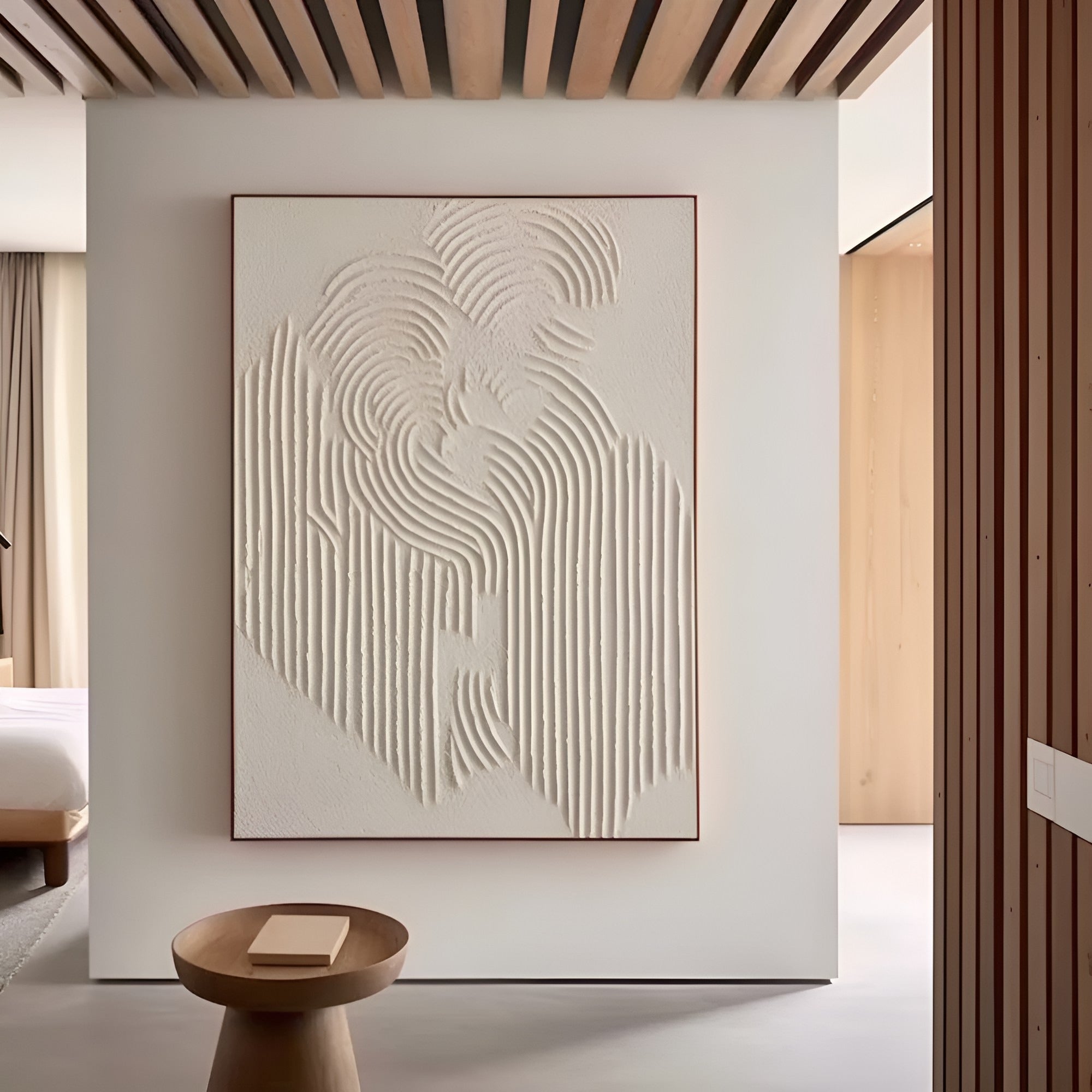 Three-dimensional monochrome painting with delicate, layered grooves, complementing a neutral-toned modern décor with an artistic touch.