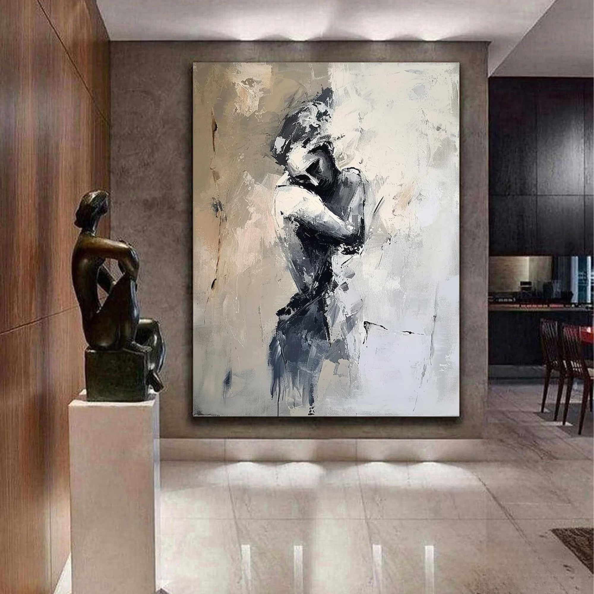Abstract painting of a figure in a tender embrace, displayed in a modern hallway with sleek marble floors and wood-paneled walls.