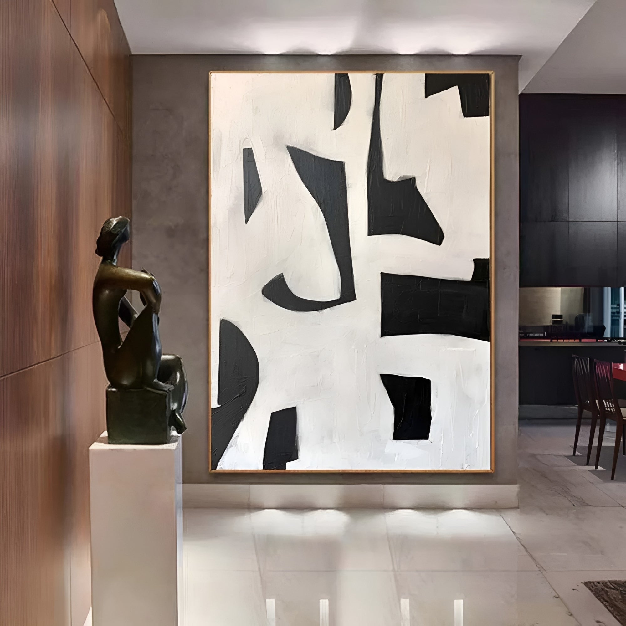 Hand-painted black and white abstract composition, enhancing a modern industrial-style home aesthetic.