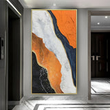 Modern abstract wall art with handmade orange and black patterns, enhancing minimalist or industrial interiors.