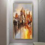 Tall city skyline wall art in expressive tones of burnt orange and deep gold, adding a dramatic focal point to modern living or dining spaces.