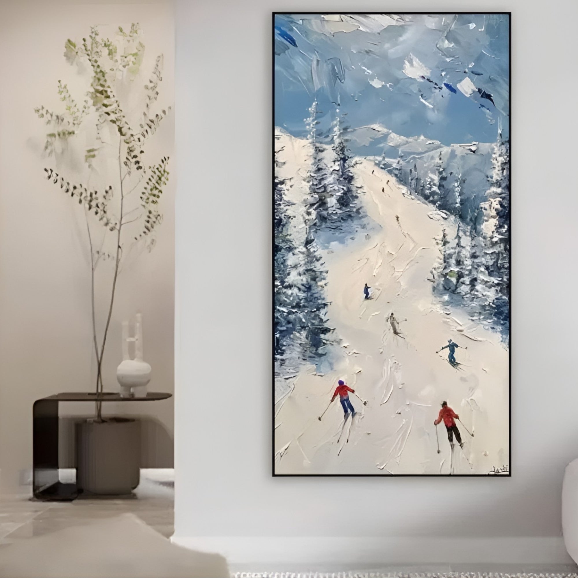 Handmade ski painting with textured oil strokes depicting skiers on a snowy mountain slope, framed in a modern living room.