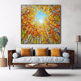 Contemporary fall forest painting with a dreamlike upward view, rich in textured leaves and vertical tree trunks. A great match for bright sitting areas, modern lounges, or creative workspaces