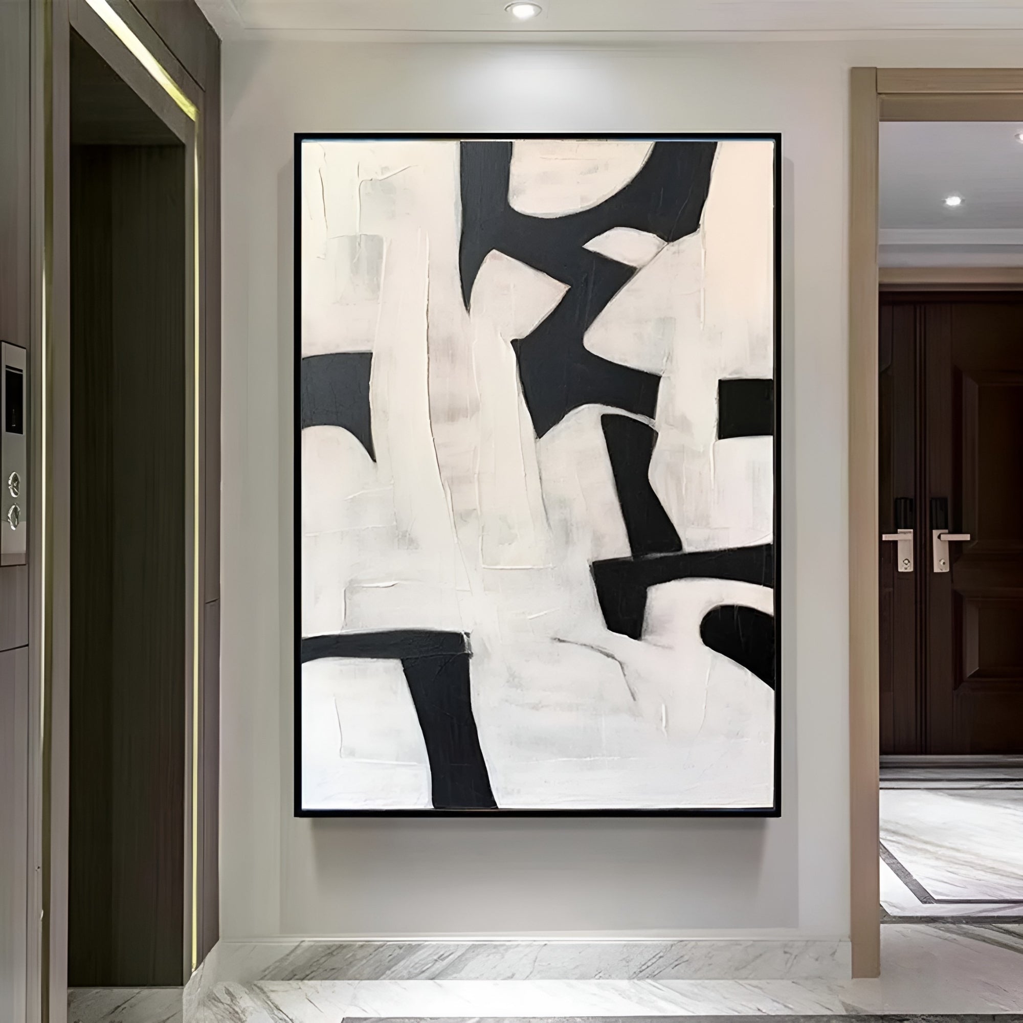 Large monochrome canvas with bold abstract brushstrokes, perfect for contemporary living room styling.