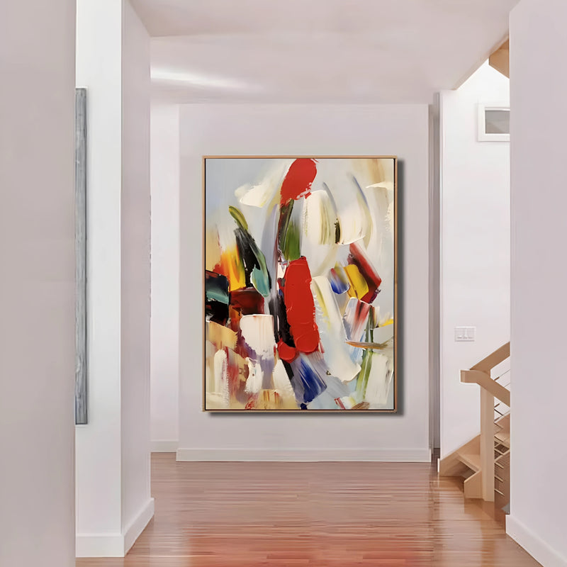 Large abstract canvas with a mix of primary and secondary colors in broad, fluid strokes, evoking motion and emotion.