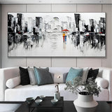 Abstract city skyline wall art, handmade in neutral tones with a bold accent, ideal for entryways or home offices.