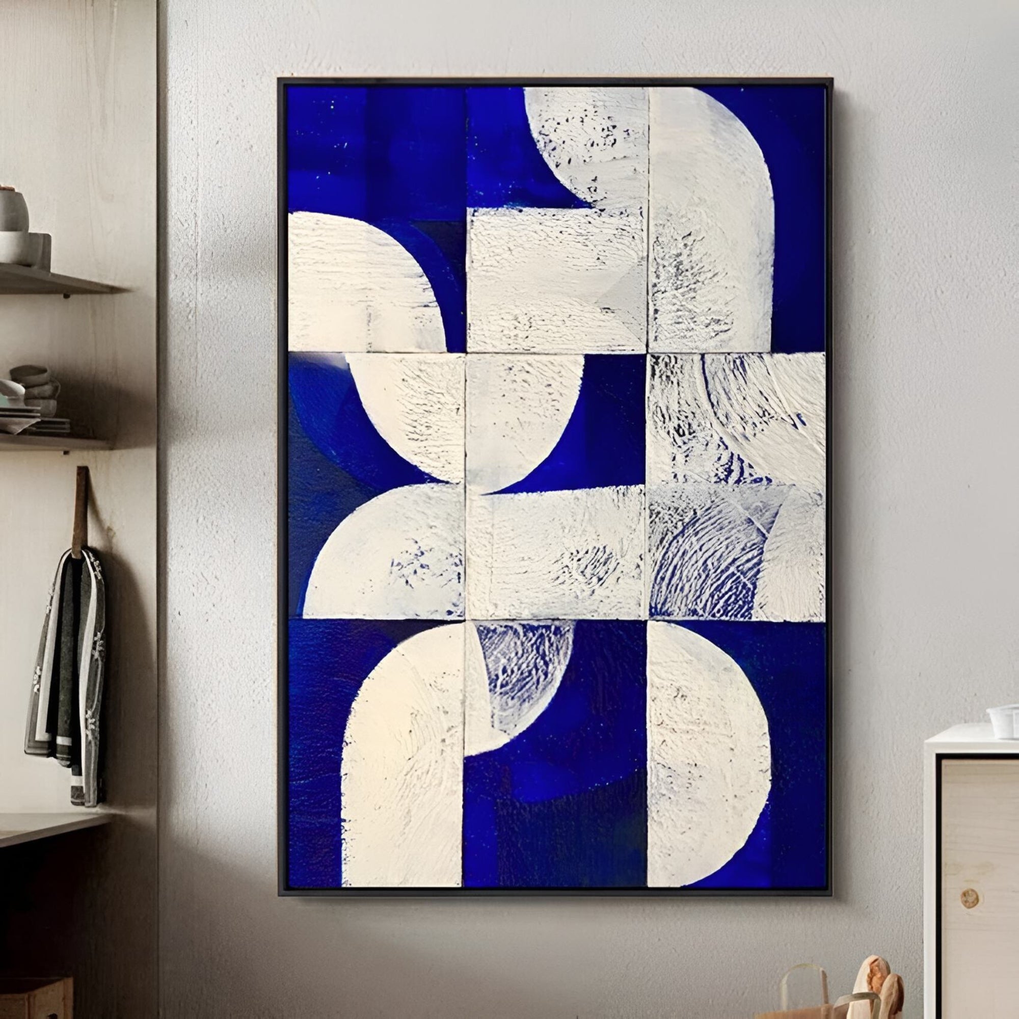Contemporary painting with rhythmic white curves and rectangles on a rich cobalt blue field.
Perfect for a trendy café corner, a minimalist home workspace, or an art-themed dining area