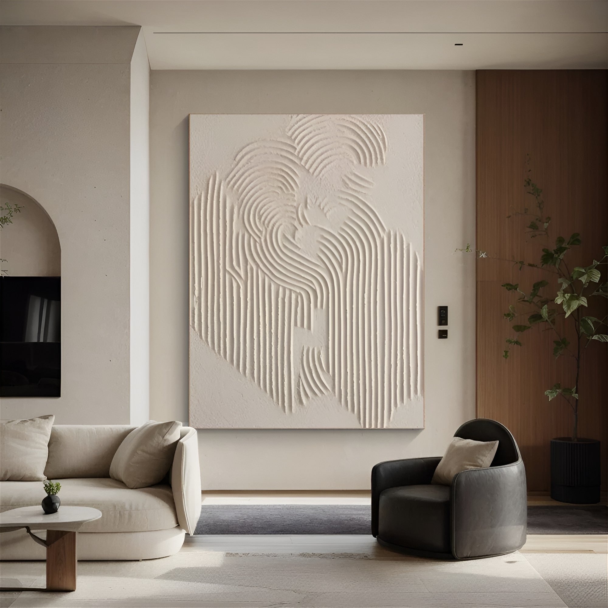 Handmade plaster-style artwork with organic curved textures, creating a visually dynamic and tactile focal point in a minimalist setting.