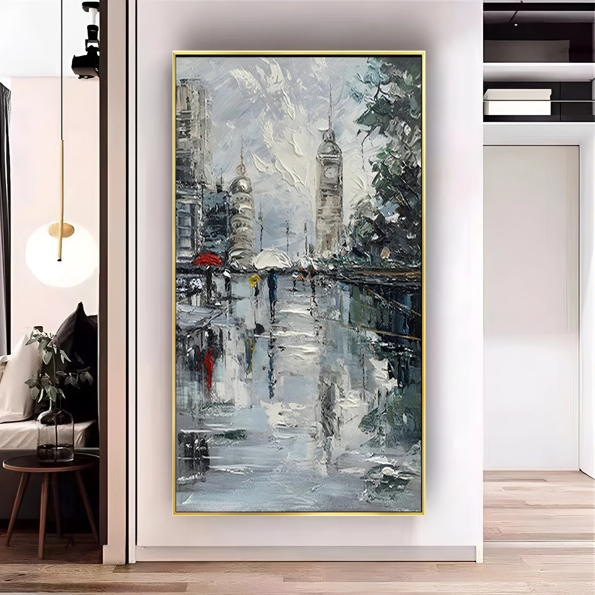 Impressionist cityscape wall art featuring a foggy urban day with blurred reflections on wet pavement, framed in black and displayed near a contemporary fireplace.