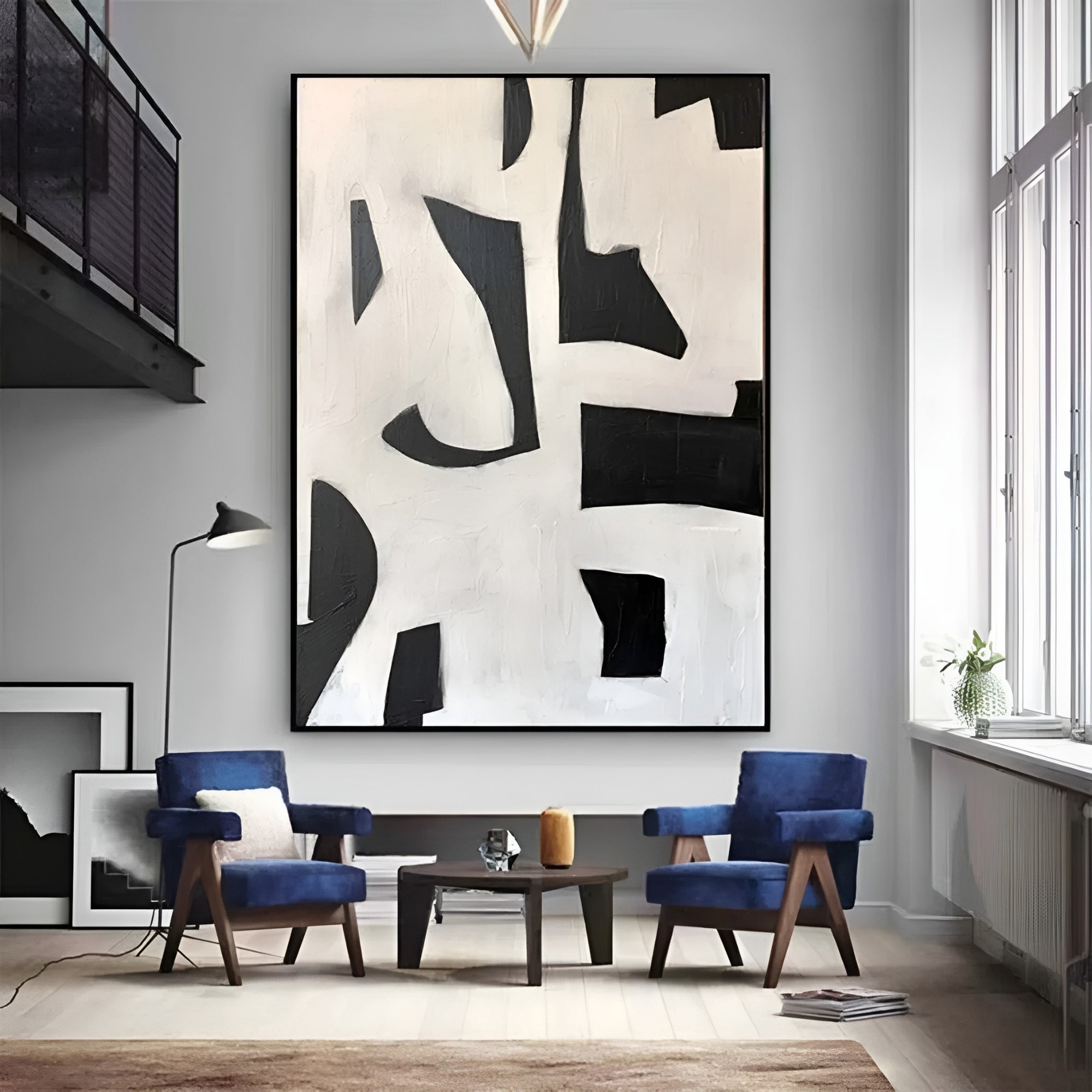Stylish black and white artwork – abstract expressionism painting in a high-end modern dining space.