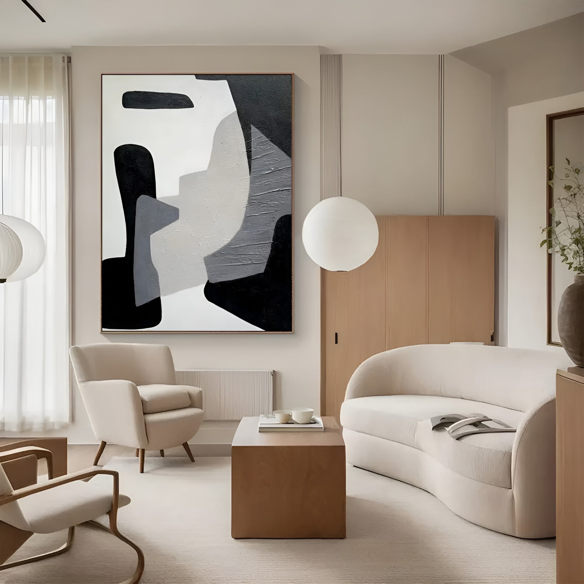 Luxury living room with large geometric abstract artwork - Monochrome wall decor inspiration.