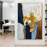Handmade oil painting adds a bold artistic statement to modern office spaces with minimalist decor.