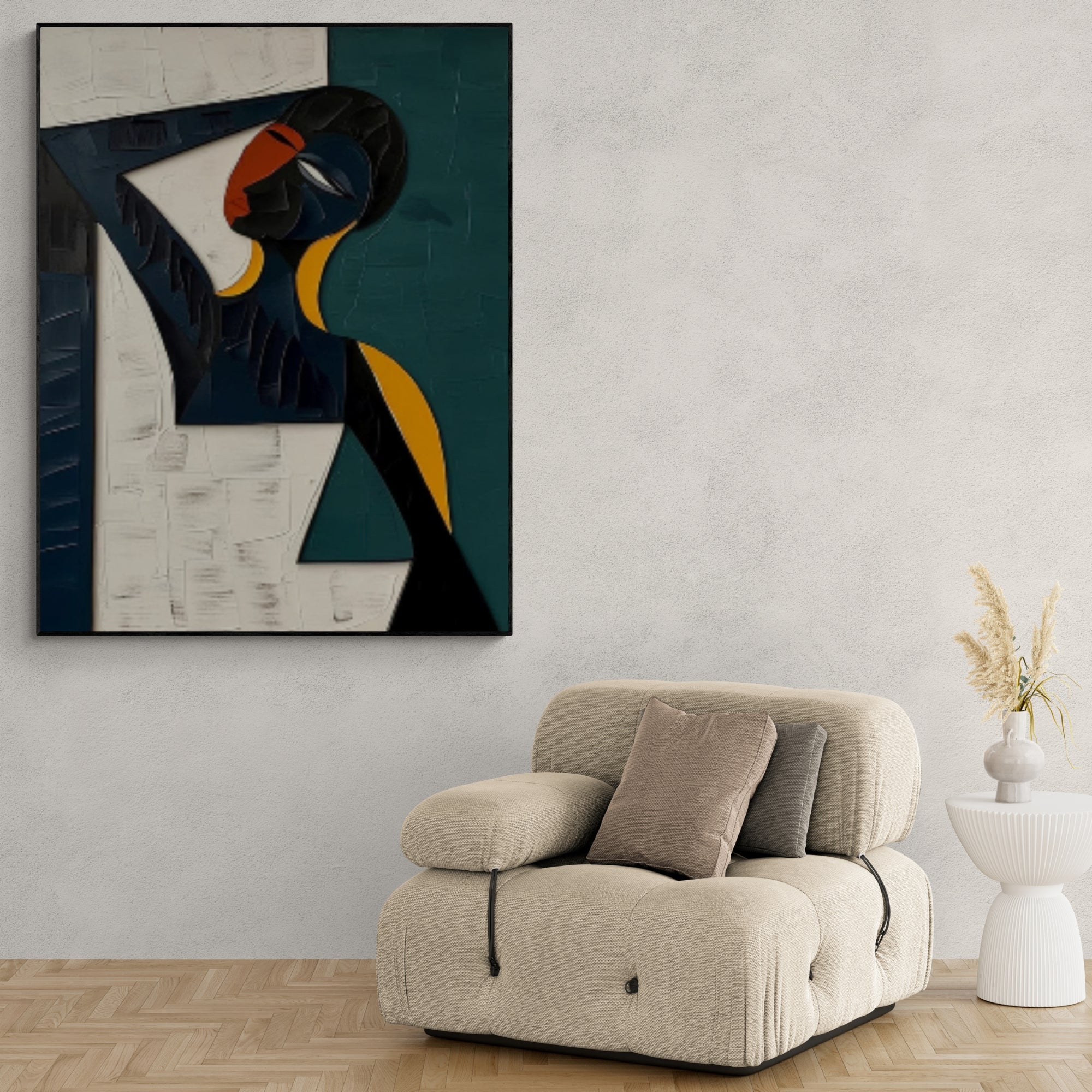 Bold and minimalist textured artwork featuring a stylized female figure with clean lines and contrasting colors, hanging above a neutral armchair in a cozy reading nook.