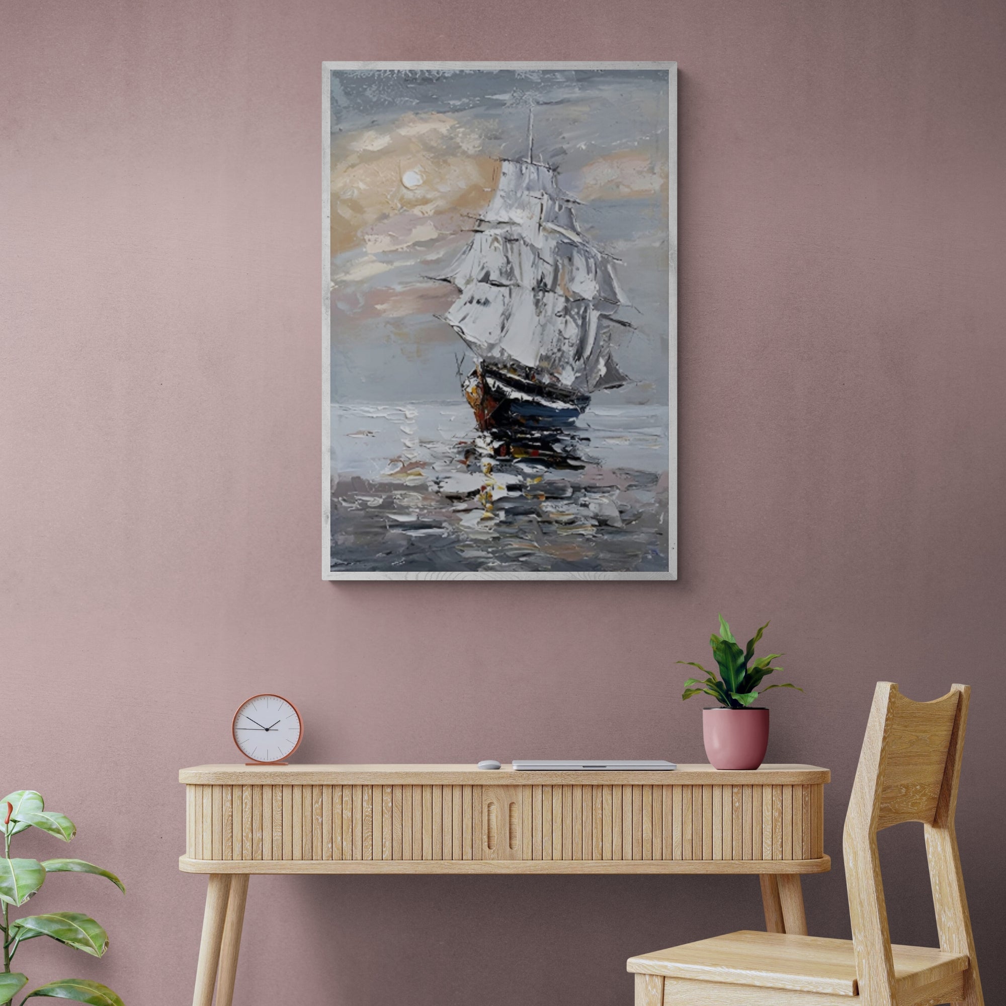 Maritime oil painting of a tall ship at sunrise, adding charm and depth to a cozy minimalist study room.