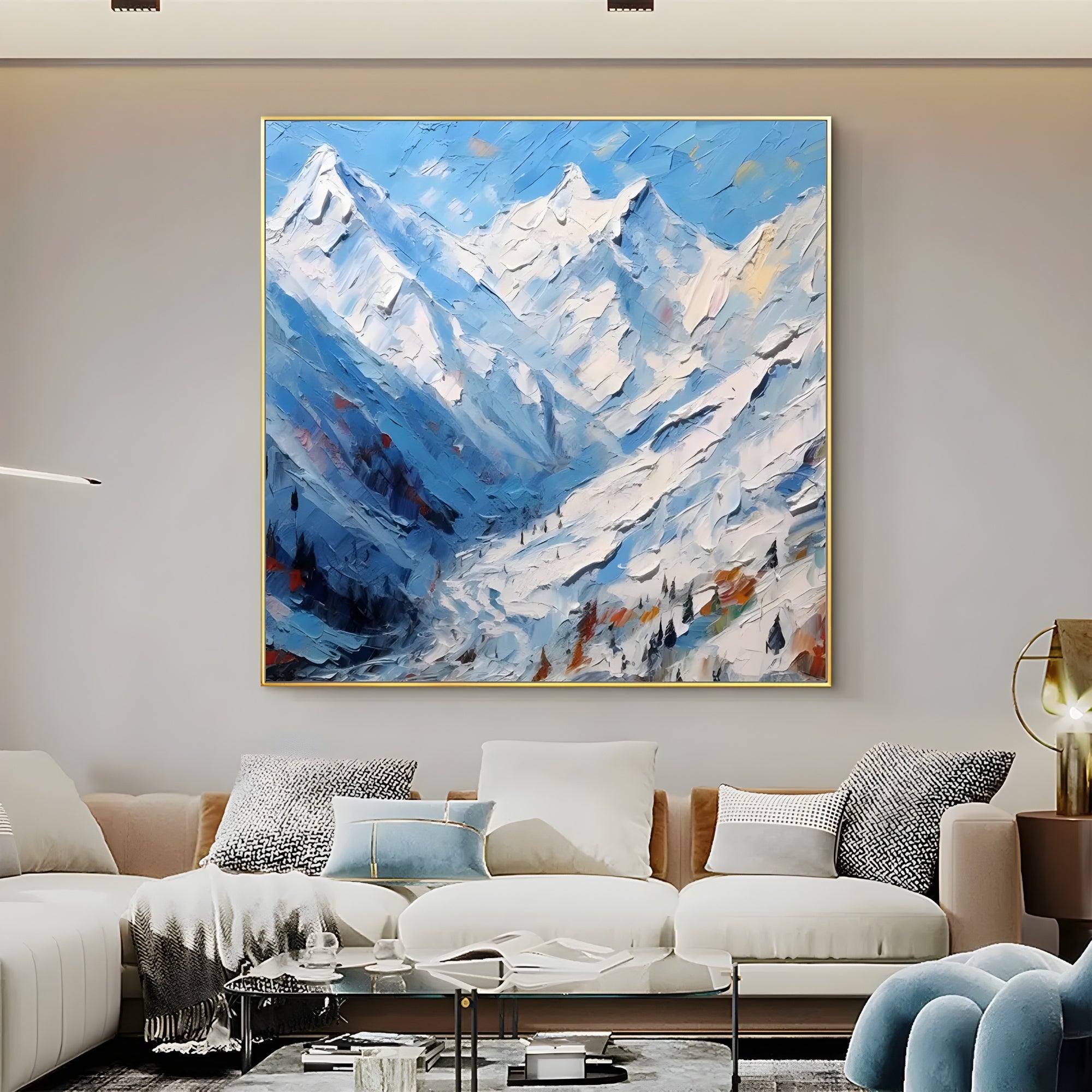 Blue and white mountain artwork adds a cool, refreshing touch to contemporary living rooms.