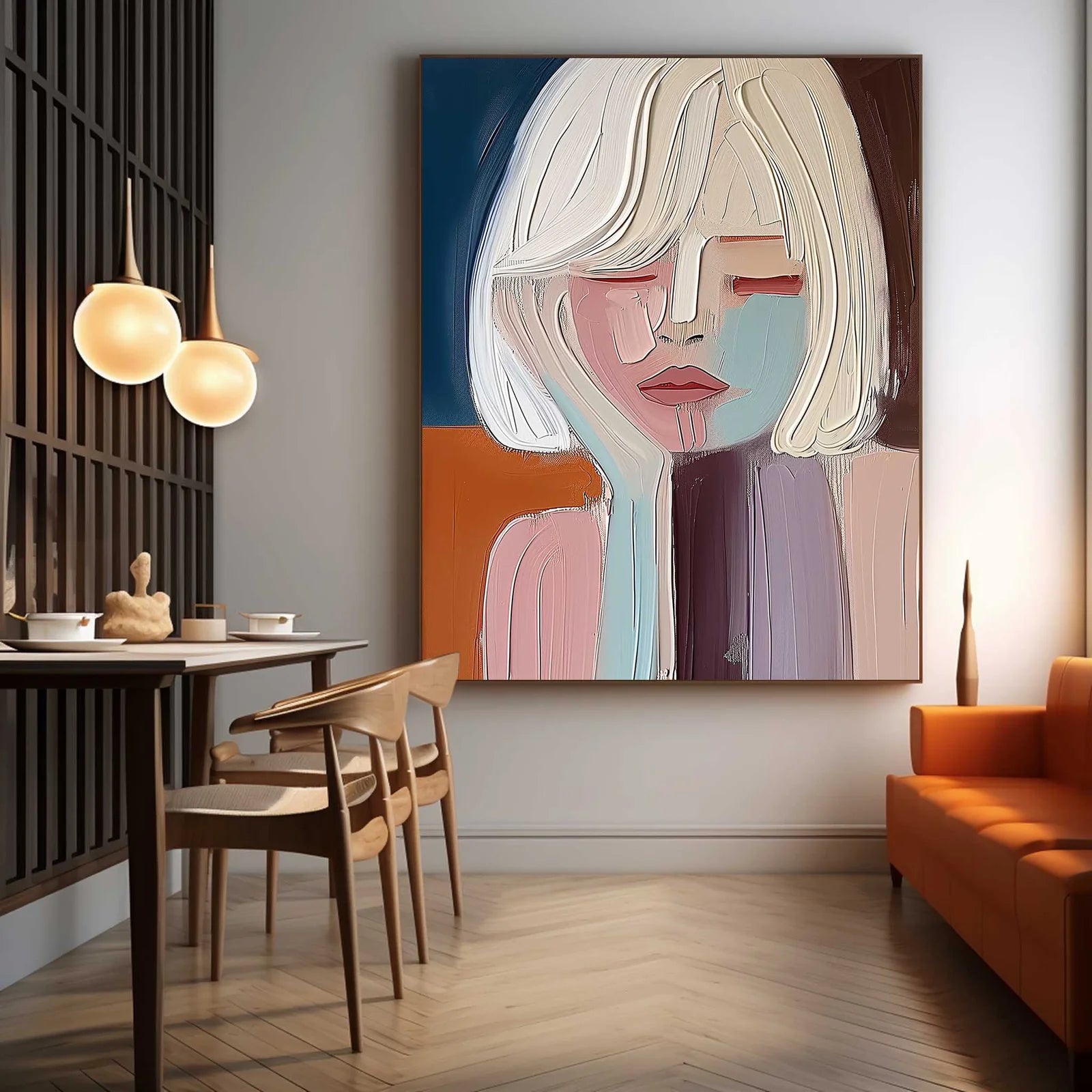 Modern abstract artwork with feminine features and bold brushstrokes, framed in a cozy dining area